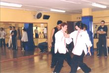 Sifu Jason Wong couching a push hands match