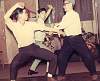 Click Here! Doc-Fai Wong (center) training kung fu with his teacher Lau Bun (on the right),in 1965