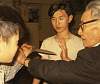 Click Here! Doc-Fai Wong (center) learning CLF applications from Lau Bun (on the right) in 1966