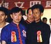 Click Here! August 1998 Grandmaster Doc-Fai Wong (blue outfit) with his si-suk Chan Sun Chiu